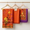 Japanese Imported Cotrai 3-piece suit in vibrant orange and purple floral print on wooden hangers