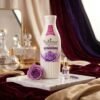 Enchanteur Alluring Satin Smooth Perfumed Lotion 100ml white bottle on marble podium — Chaudhary Superstore