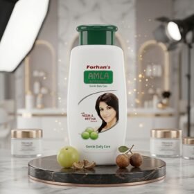 Forhan's Amla Herbal Shampoo white bottle with green cap on a luxury studio marble podium with fresh amla and reetha from Chaudhary Superstore