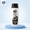Hello Hair Silky Black Shine Shampoo 75ml bottle displayed on a luxury light blue studio podium from Chaudhary Superstore