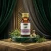 Hemani 100% Natural Rosemary Oil 30ml amber glass bottle on green marble stand from Chaudhary Superstore
