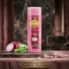 Jamy Onion & Aloe Vera Shampoo Xtraordinary Strong Hair 180ml pink bottle displayed on a luxury studio marble podium from Chaudhary Superstore