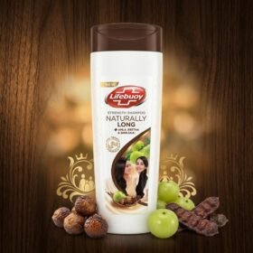 Lifebuoy Naturally Long Shampoo 90ml bottle on a luxury wooden studio podium from Chaudhary Superstore