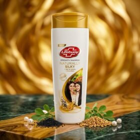 Lifebuoy Naturally Silky Shampoo 175ml bottle displayed on a luxury dark marble surface with traditional botanical props by Chaudhary Superstore