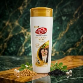 Lifebuoy Naturally Silky Shampoo 370ml bottle on a premium green background with natural seeds from Chaudhary Superstore
