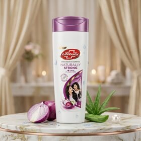 Lifebuoy Naturally Strong Shampoo 370ml bottle on a premium background with natural ingredients from Chaudhary Superstore