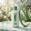 Olivia Moisturizing Cleansing Milk with Aloe Vera 110ml bottle placed on a marble surface with sliced aloe vera leaves