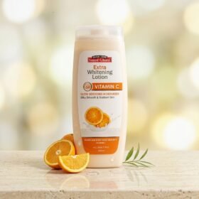 Saeed Ghani Extra Whitening Lotion Vitamin C 200ml beige bottle on marble podium — Chaudhary Superstore