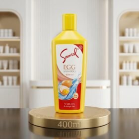Samsol Egg Shampoo 400ml yellow bottle displayed on a luxury golden studio podium by Chaudhary Superstore