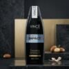 Vincé Men Perfect Impact 2 in 1 Shampoo + Conditioner 230ml black bottle on luxury studio podium from Chaudhary Superstore