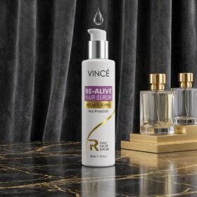 VINCÉ Re-Alive Hair Serum Absolute Revival Heat Protection 80ml pump bottle on dark marble surface from Chaudhary Superstore