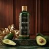Vincé Sulfate Free Avocado Shampoo Anti-Dandruff 300ml bottle displayed on a luxury green marble studio podium from Chaudhary Superstore