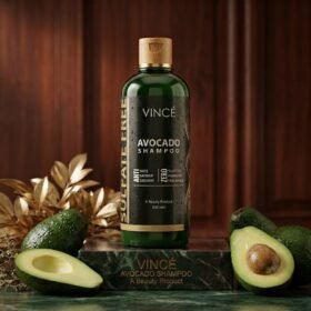 Vincé Sulfate Free Avocado Shampoo Anti-Dandruff 300ml bottle displayed on a luxury green marble studio podium from Chaudhary Superstore