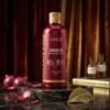 Vincé Sulfate Free Onion Shampoo Anti Flake 300ml maroon bottle displayed on a luxury studio marble block from Chaudhary Superstore