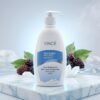Vincé Whitening Body Milk Alpha Arbutin & Mulberry Extract 330ml pump bottle on a marble podium — Chaudhary Superstore