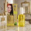 YC Silky Hair Coat Extra Anti-Pollution With Aloe Vera Extract 45ml golden bottle and box on marble counter from Chaudhary Superstore